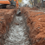 how deep should retaining wall foundations be